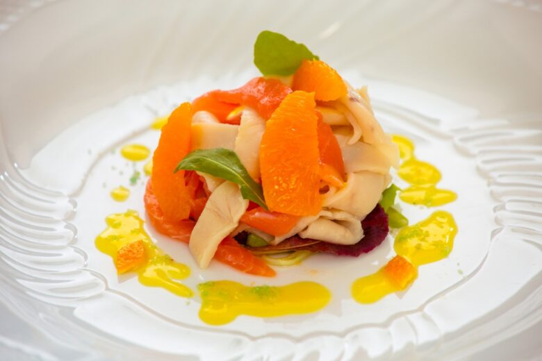 Carpaccio di pesce spada e salmone con arancia