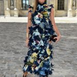 Fiori, piume, blu pavone: quintessential Anna. #streetstyle PFW september 2014