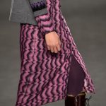 Anna Sui abito viola indossato con stivali alti