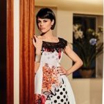 Cannella. Un look ispirato ai matador impreziosito da frange e passamanerie