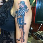 Pin up tattoo by Mik Zion