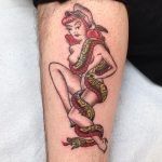 Pin up tattoo by Joel Brewer