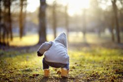 Toddler boy playing outdoors