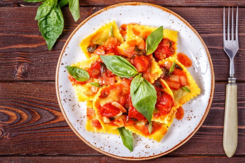 Ravioli di spigola fagiolini e pomodoro