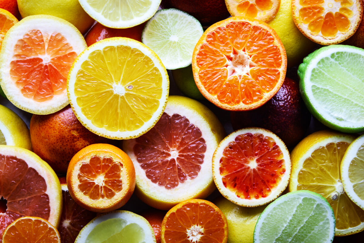 Mix of different citrus fruits closeup. Healthy diet vitamin concept.